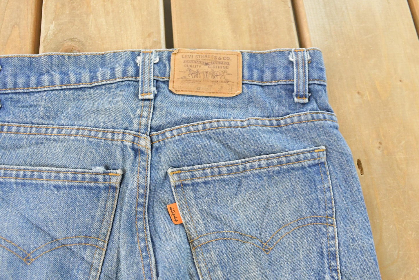 Vintage 1990s Levi's Distressed 716 Orange Tab Student Denim Jeans Men's 28 x 31 from propervintagecanada
