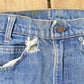 Vintage 1990s Levi's Distressed 716 Orange Tab Student Denim Jeans Men's 28 x 31 from propervintagecanada