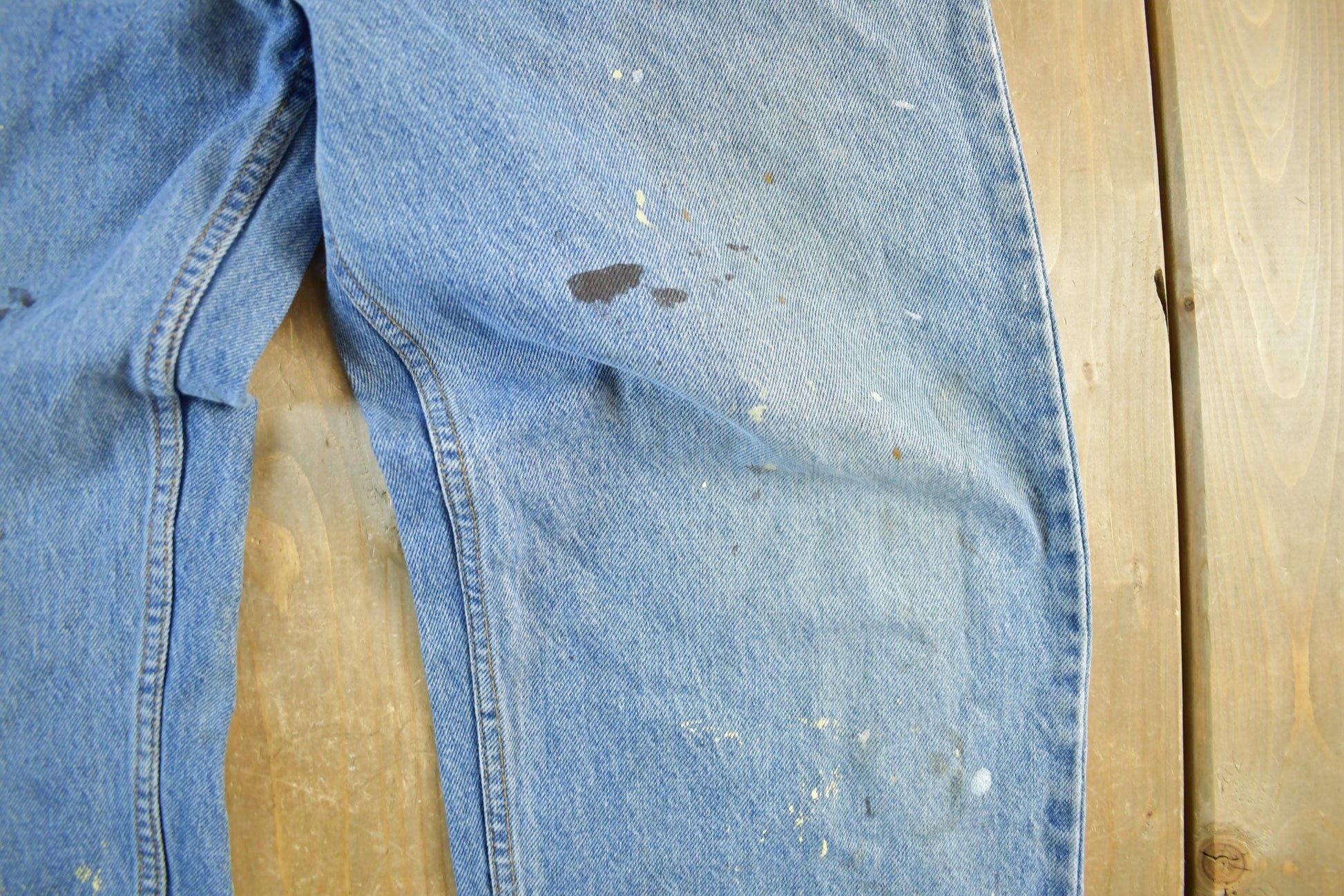 Vintage 1990s Levi's Paint Distressed Orange Tab Denim Jeans Men's 34 x 34 from propervintagecanada