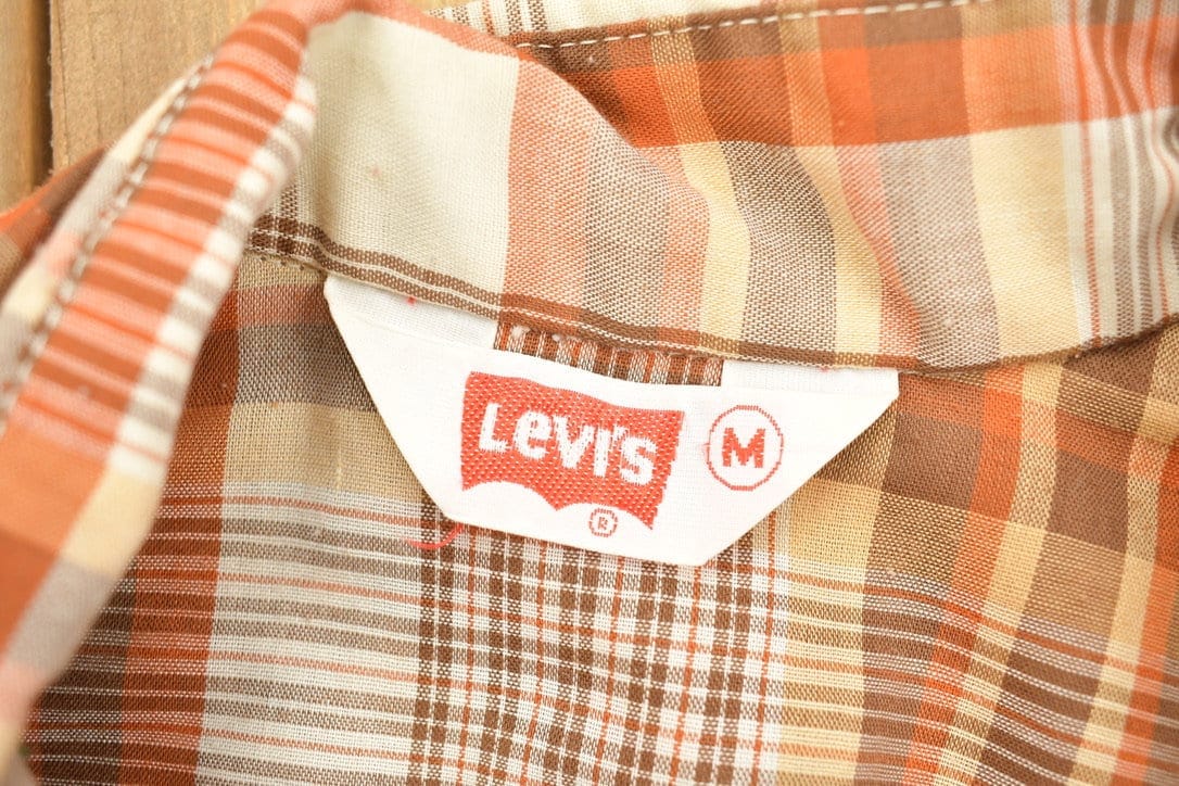 Vintage 1990s Levi's Plaid Western Flannel Button Up Shirt Men's Medium from propervintagecanada