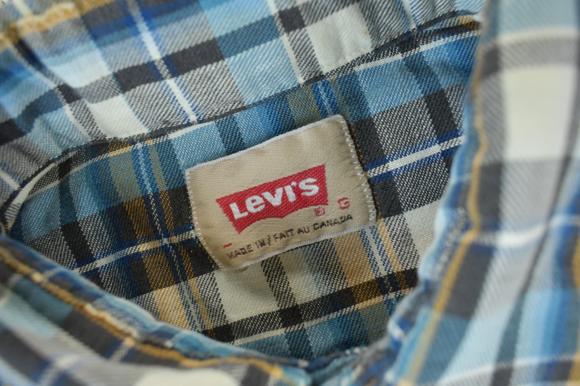 Vintage 1990s Levi's Western Wear Pearl Snap Plaid Button Up Shirt Men's Medium from propervintagecanada