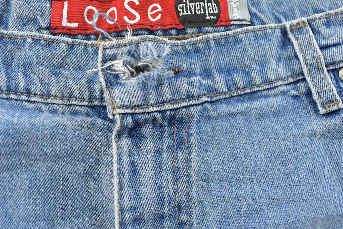 Vintage 1990s Levi Silver Tab Loose Wide Leg Denim Blue Jeans Men's 37 x 32 from propervintagecanada