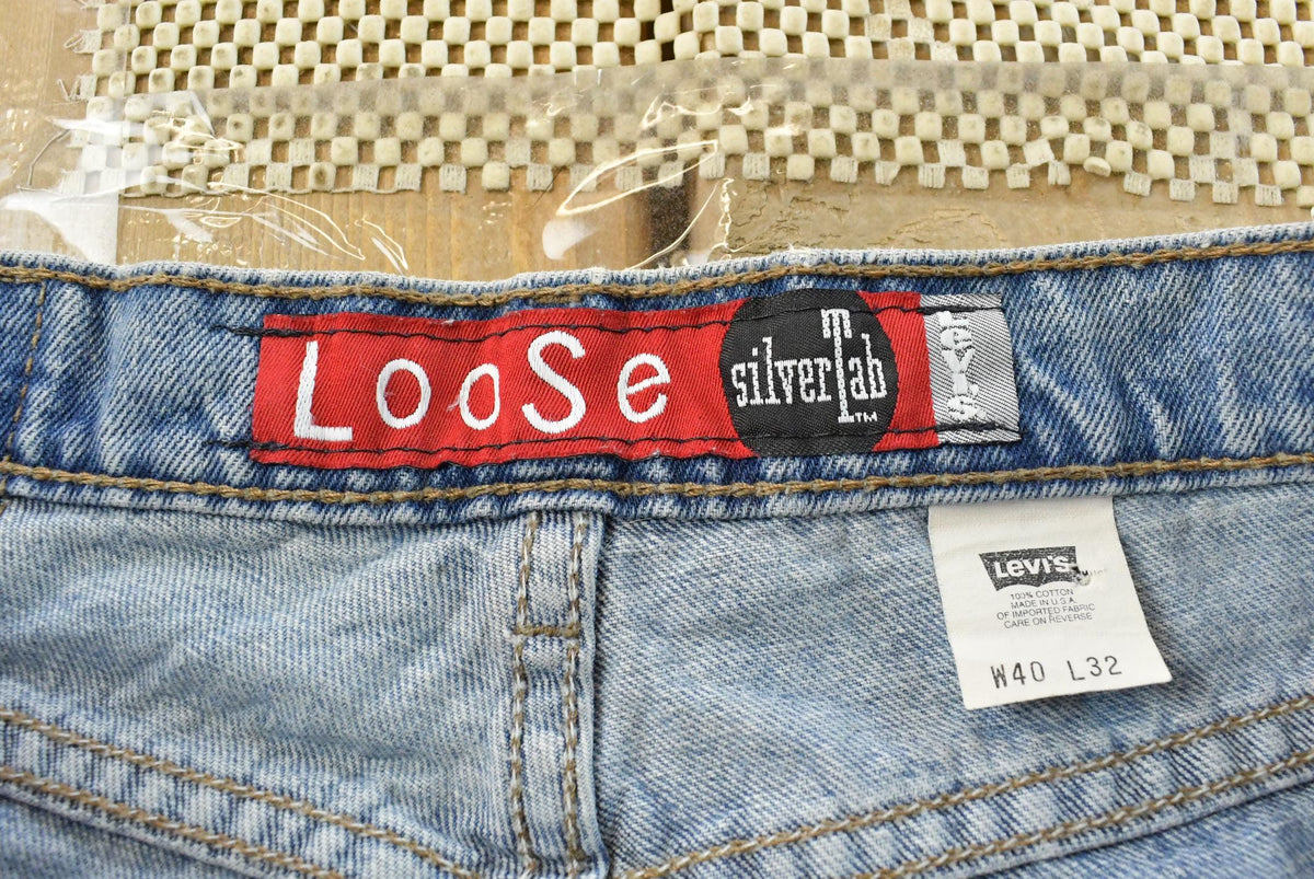 Vintage 1990s Levi Silver Tab Loose Wide Leg Denim Blue Jeans Men's 37 x 32 from propervintagecanada