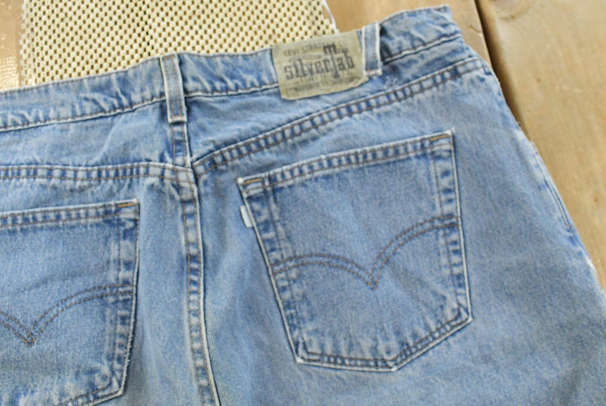 Vintage 1990s Levi Silver Tab Loose Wide Leg Denim Blue Jeans Men's 37 x 32 from propervintagecanada
