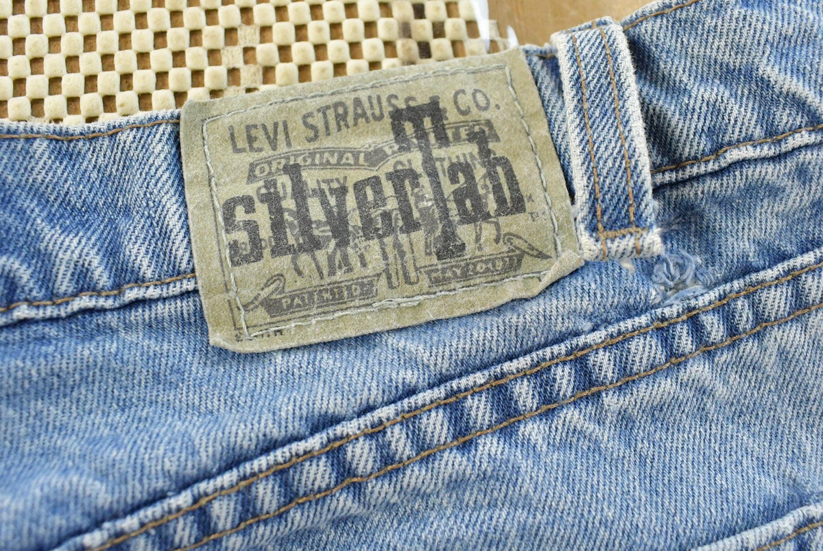 Vintage 1990s Levi Silver Tab Loose Wide Leg Denim Blue Jeans Men's 37 x 32 from propervintagecanada