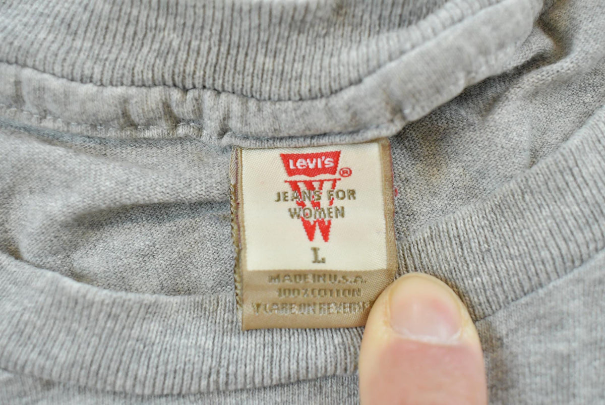 Vintage 1990s Levis Red Tab Denim Graphic T-Shirt Mens M from propervintagecanada
