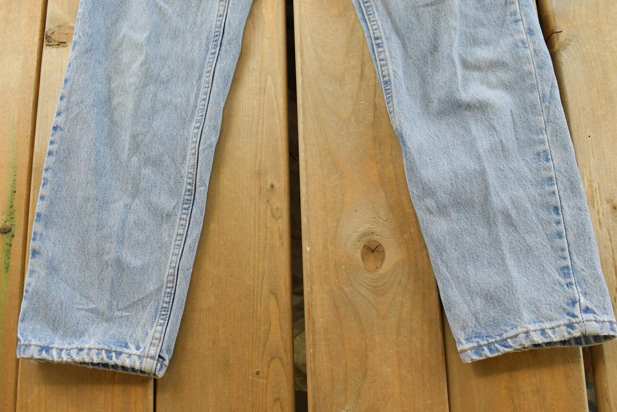 Vintage 1990s Levis Relaxed Fit Tapered Leg 550 Denim Blue Jeans Men's 26 x 28 from propervintagecanada