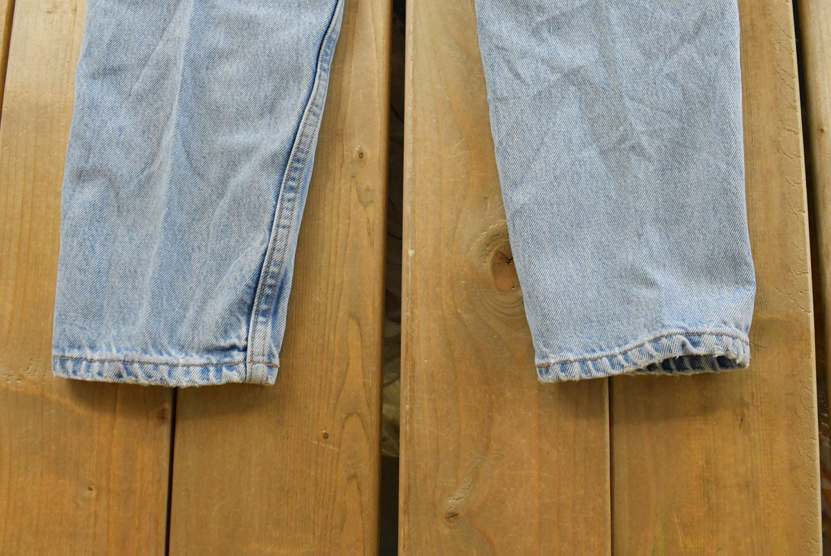 Vintage 1990s Levis Relaxed Fit Tapered Leg 550 Denim Blue Jeans Men's 26 x 28 from propervintagecanada