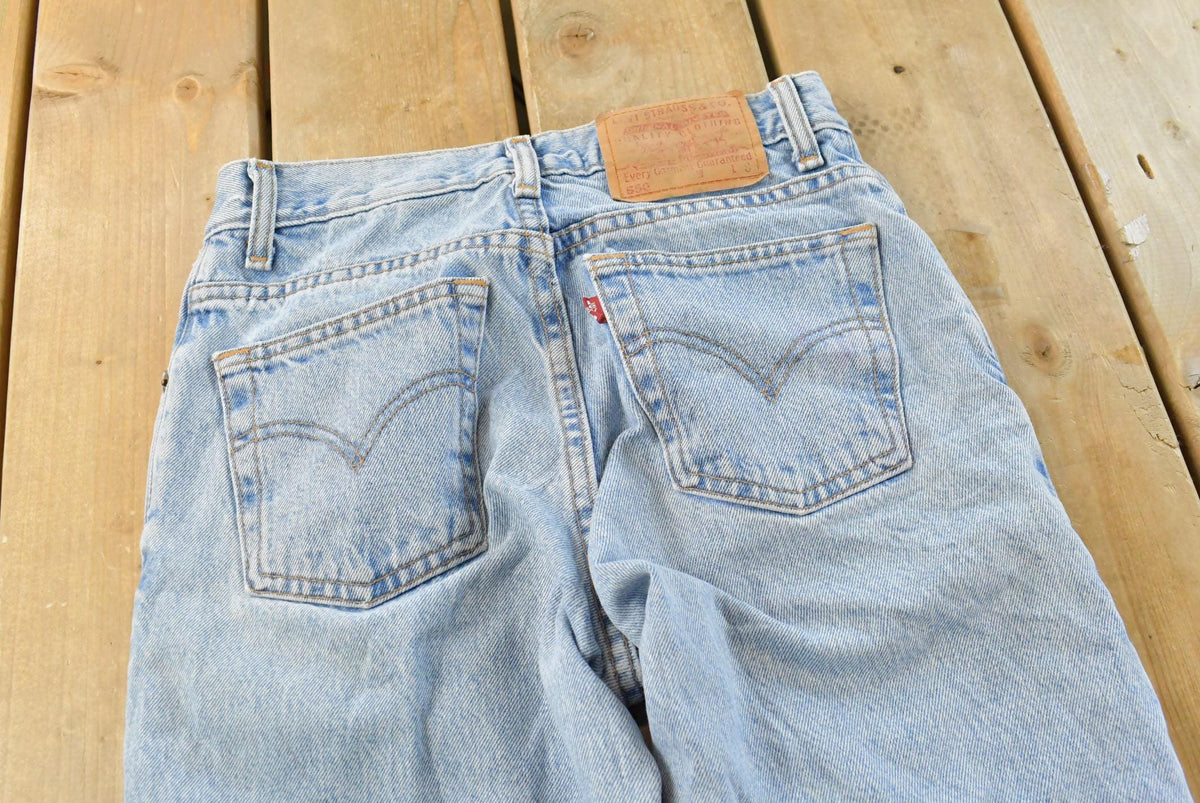 Vintage 1990s Levis Relaxed Fit Tapered Leg 550 Denim Blue Jeans Men's 26 x 28 from propervintagecanada