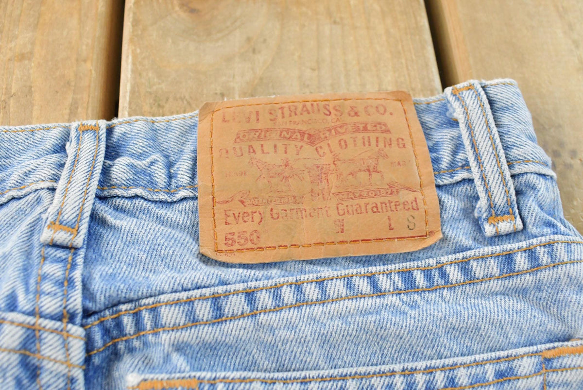 Vintage 1990s Levis Relaxed Fit Tapered Leg 550 Denim Blue Jeans Men's 26 x 28 from propervintagecanada