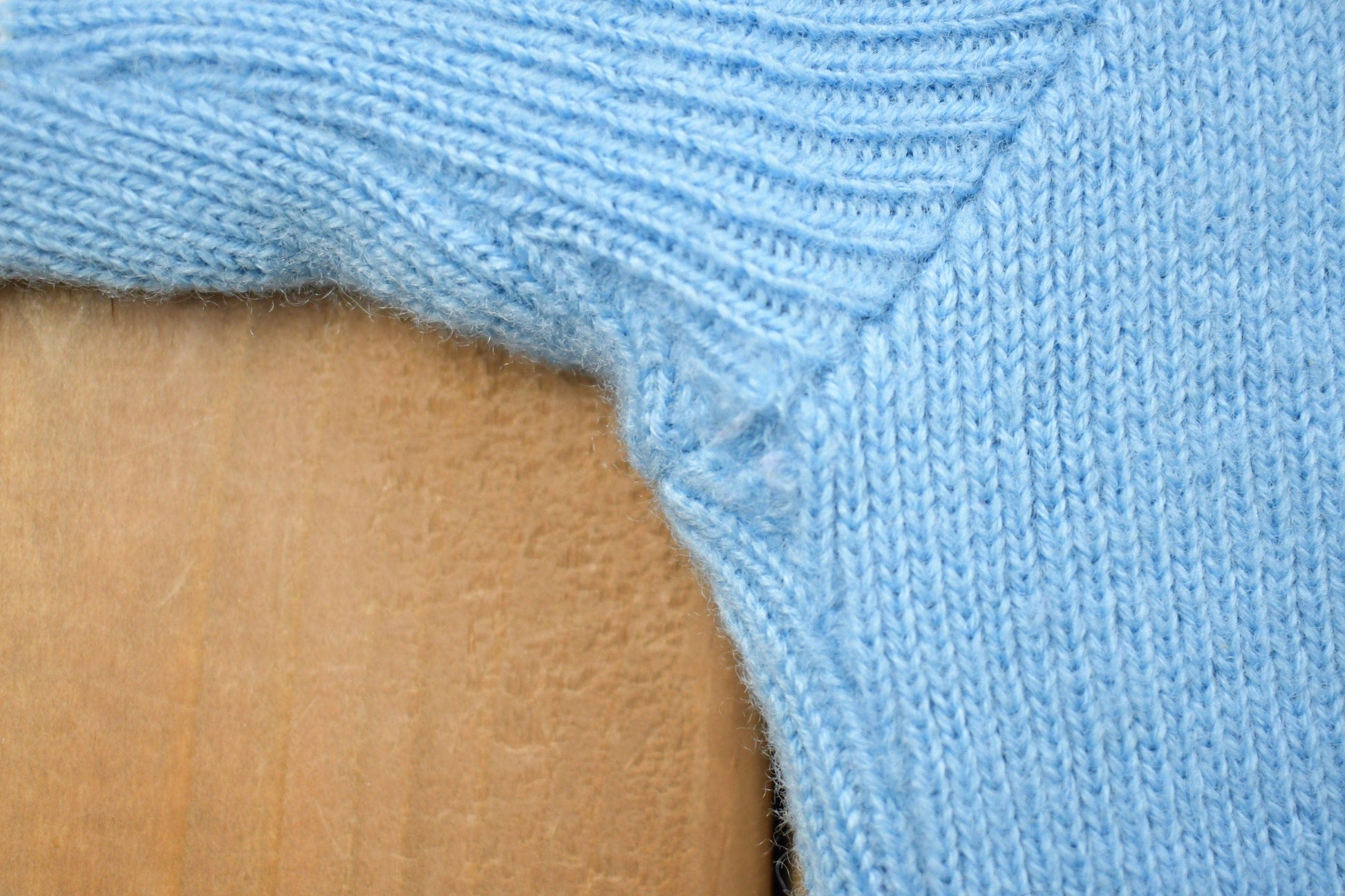 Vintage 1990s Light Blue 100% Wool Knit Sweater Men's XL from propervintagecanada