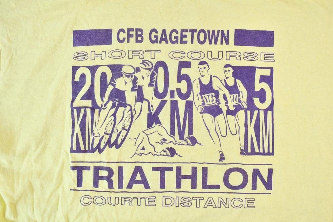 Vintage 1990s Light Yellow Penmans CFB Gagetown Short Course Triathlon Single Stitch Graphic T-Shirt Men's Large from propervintagecanada