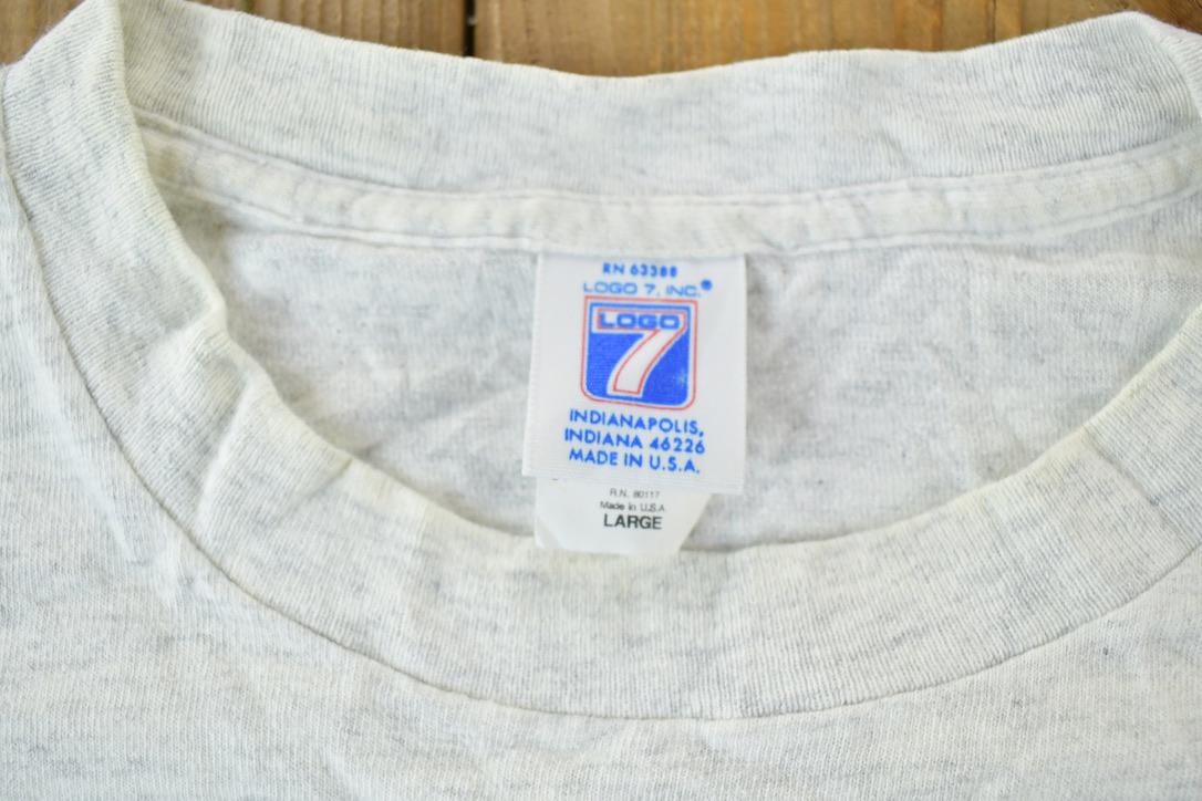 Vintage 1990s Logo 7 Colorado Avalanche NHL Graphic T-Shirt Men's XL from propervintagecanada