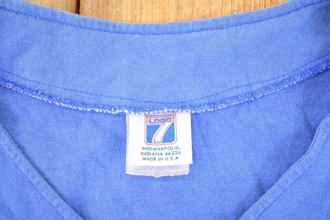 Vintage 1990s Logo 7 Texas Rangers Button Up MLB T-Shirt Men's L from propervintagecanada