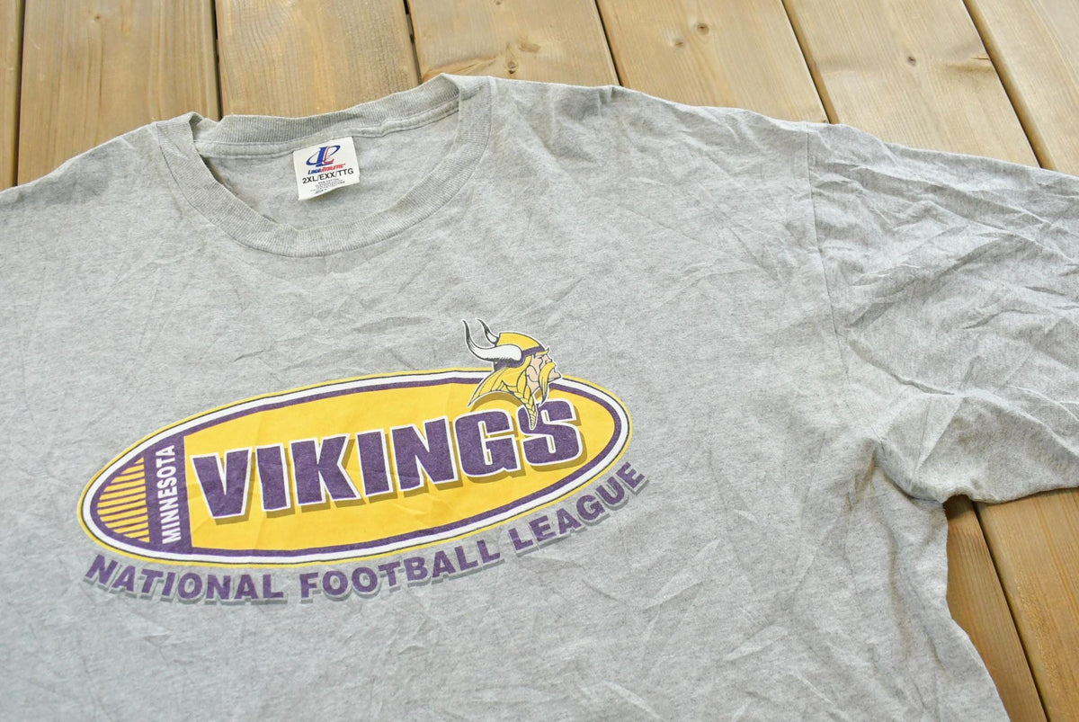 Vintage 1990s Logo Athletic Minnesota Vikings Graphic T-Shirt Mens 2XL from propervintagecanada