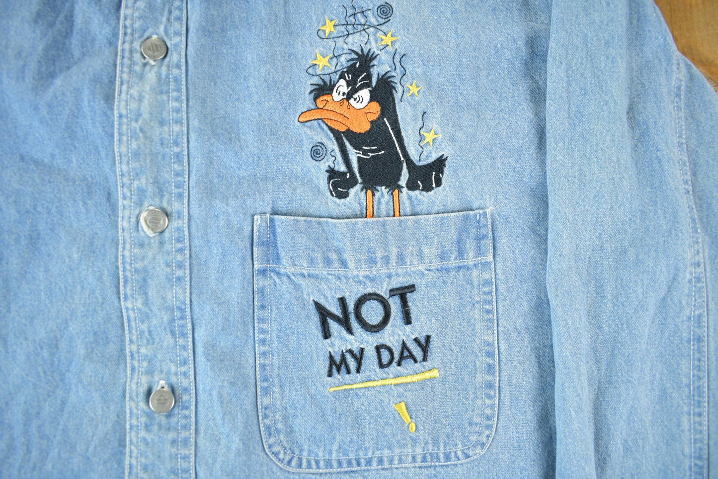 Vintage 1990s Looney Tunes Daffy Duck Denim Button Up Shirt Men's Large from propervintagecanada