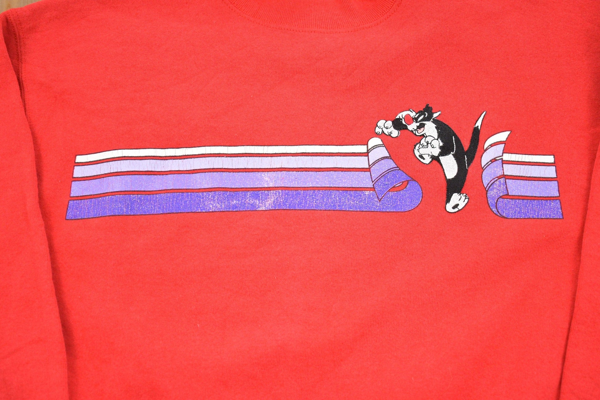 Vintage 1990s Looney Tunes Graphic Sweatshirt Men's Small from propervintagecanada