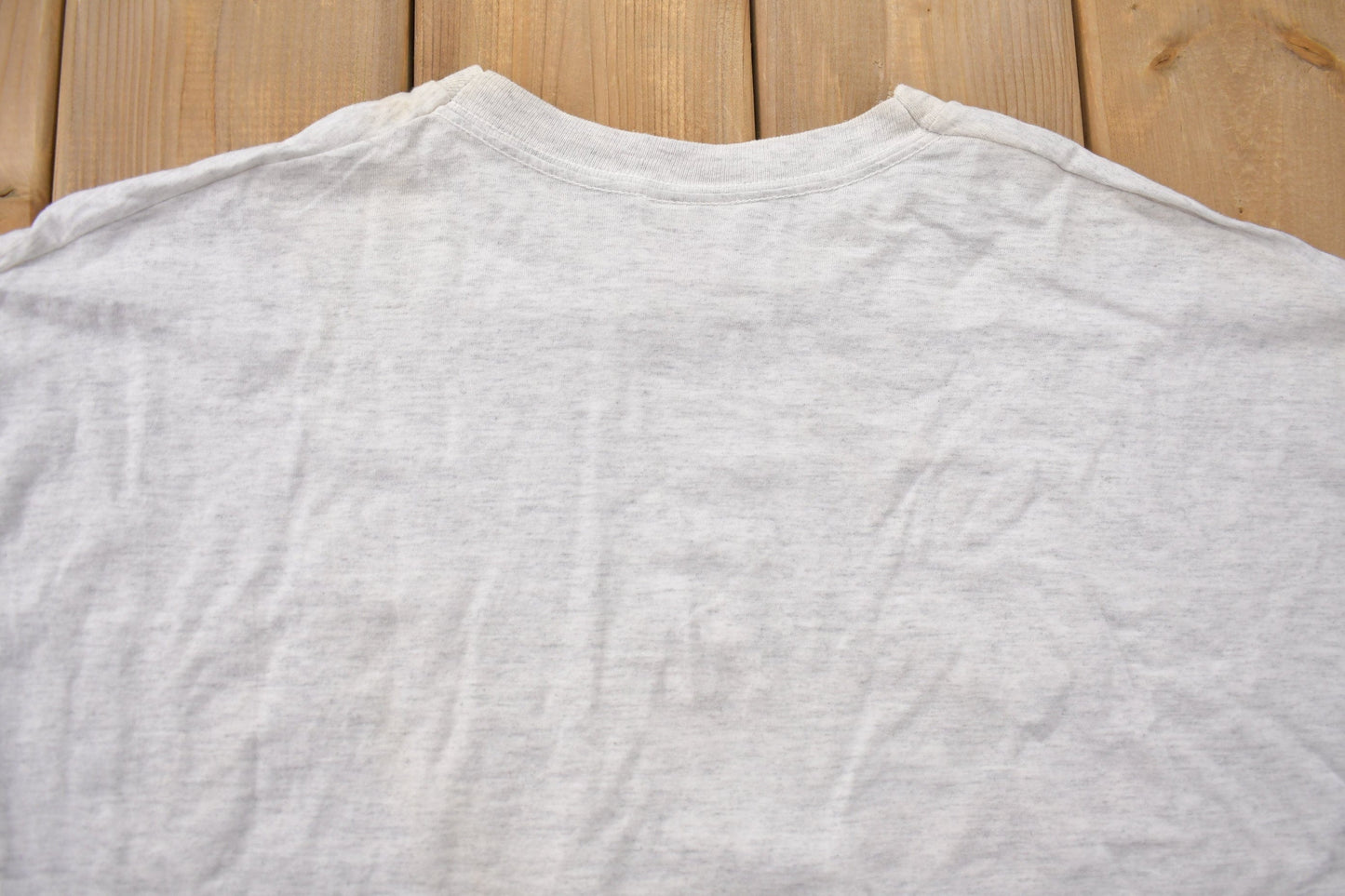 Vintage 1990s Looney Tunes Hockey Graphic T-Shirt Men's 2XL from propervintagecanada