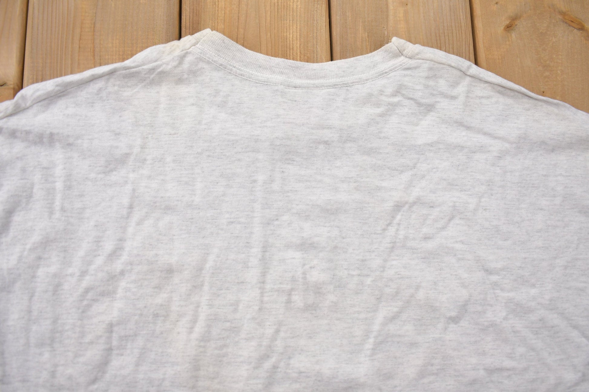 Vintage 1990s Looney Tunes Hockey Graphic T-Shirt Men's 2XL from propervintagecanada