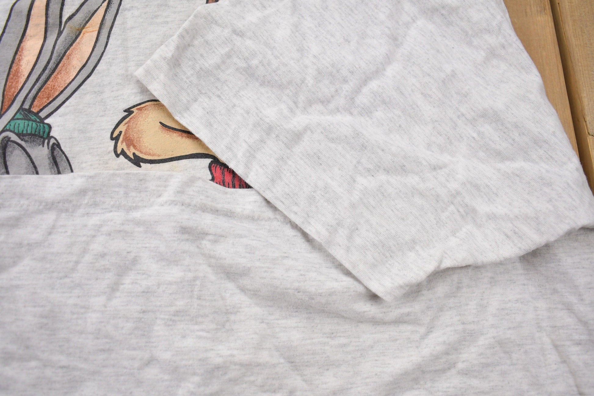 Vintage 1990s Looney Tunes Hockey Graphic T-Shirt Men's 2XL from propervintagecanada