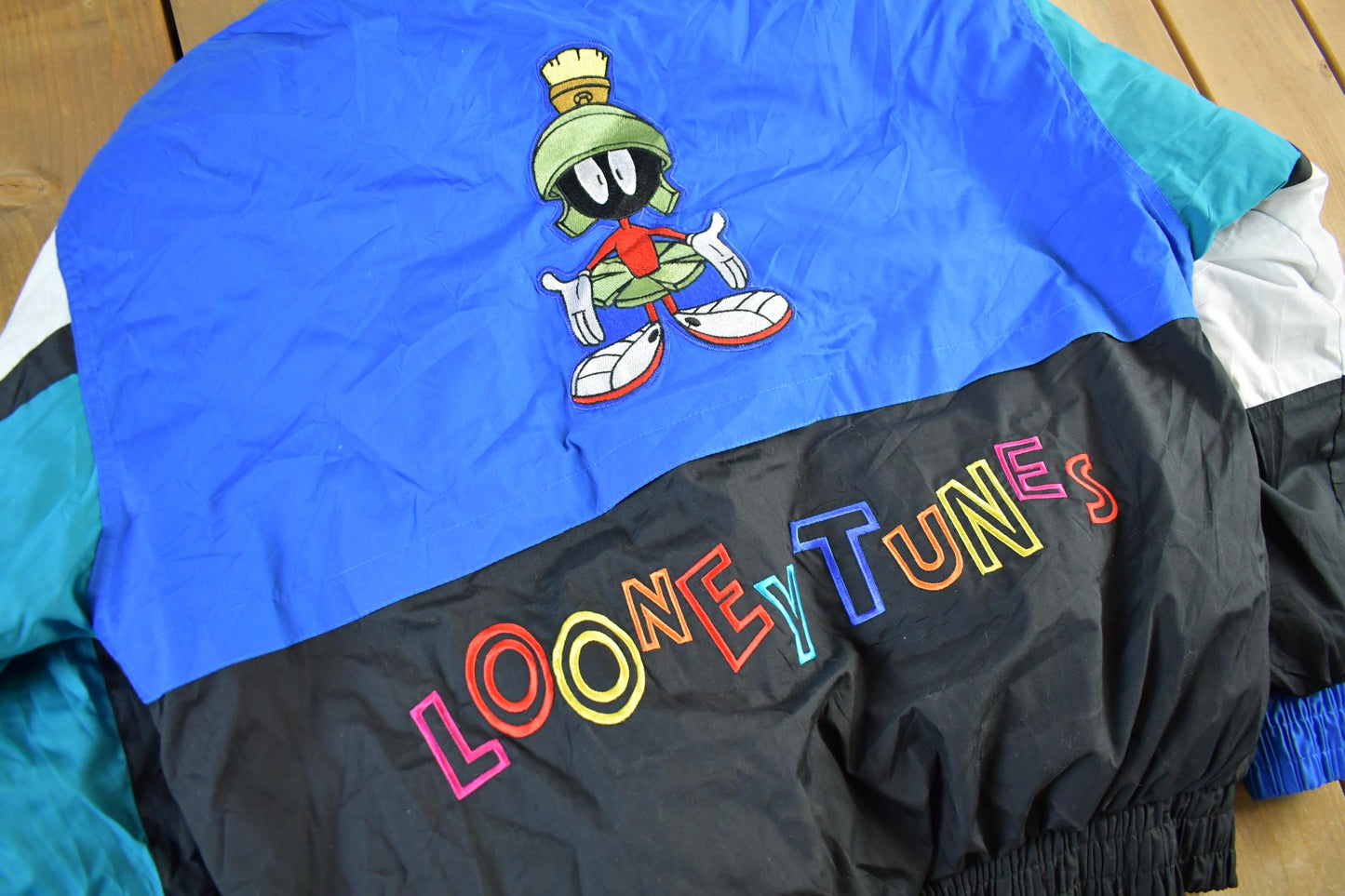 Vintage 1990s Looney Tunes Puffer Jacket Men's Large from propervintagecanada