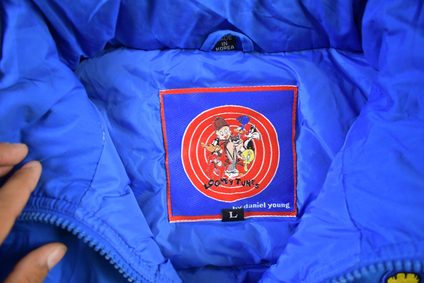 Vintage 1990s Looney Tunes Puffer Jacket Men's Large from propervintagecanada
