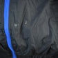 Vintage 1990s Looney Tunes Puffer Jacket Men's Large from propervintagecanada