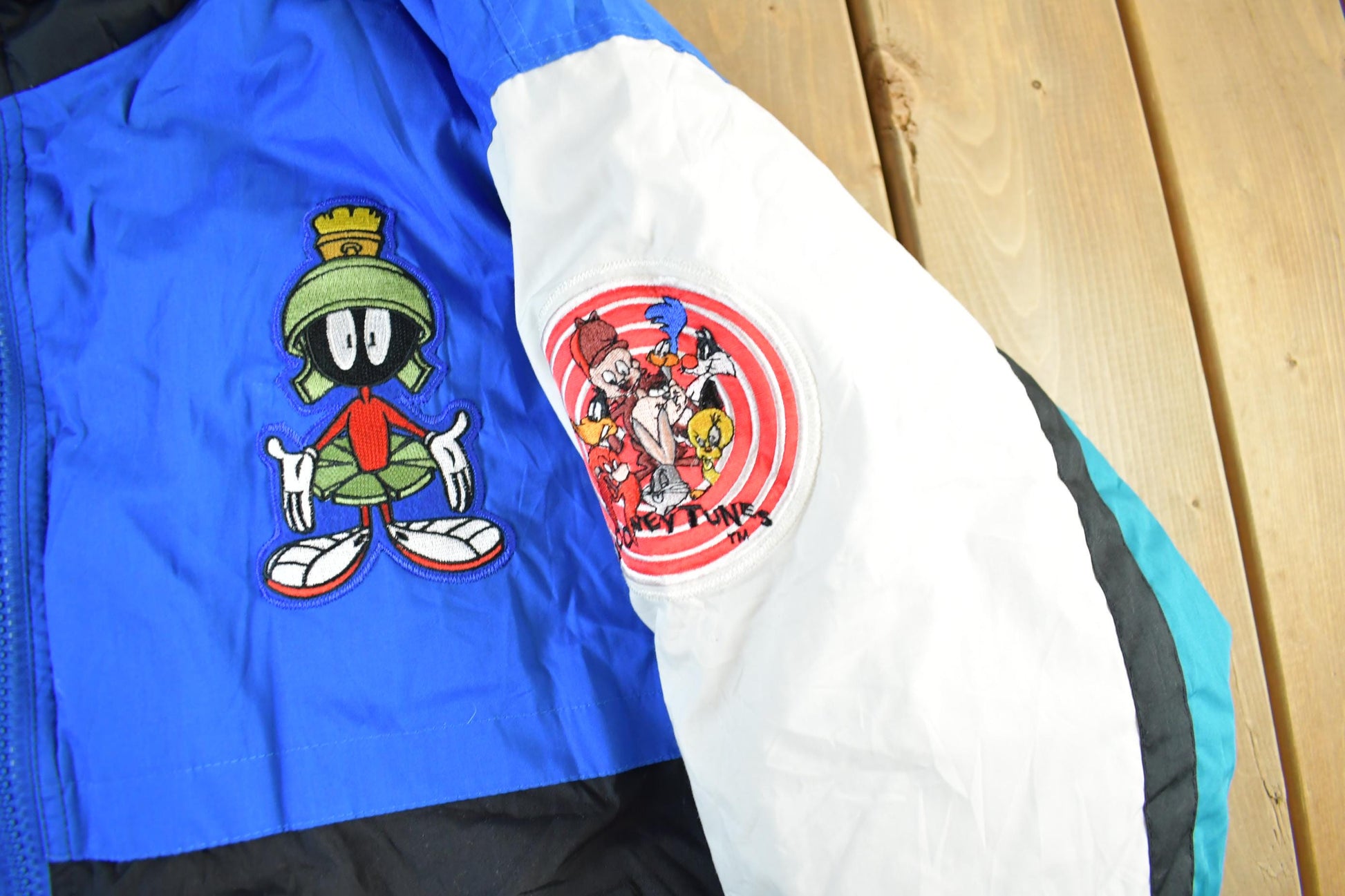 Vintage 1990s Looney Tunes Puffer Jacket Men's Large from propervintagecanada