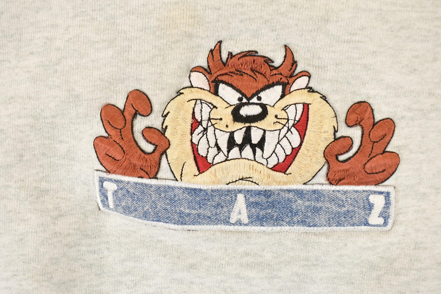 Vintage 1990s Looney Tunes Taz Embroidered Crewneck Men's L from propervintagecanada