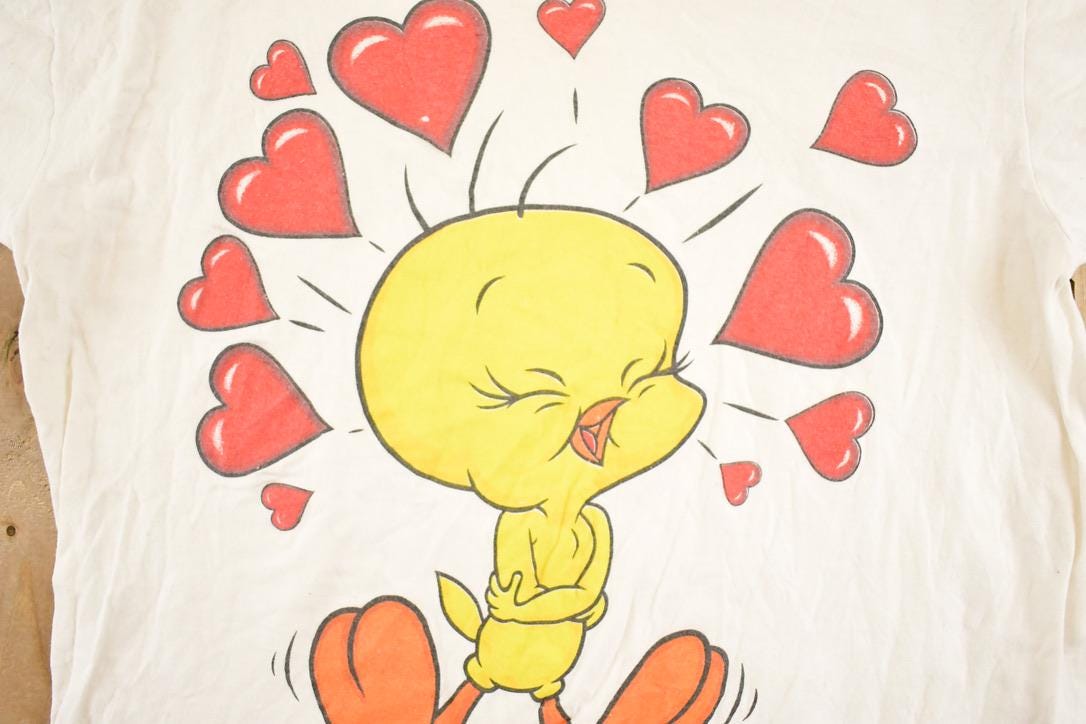 Vintage 1990s Looney Tunes Tweety Bird Hearts T Shirt Women's L from propervintagecanada