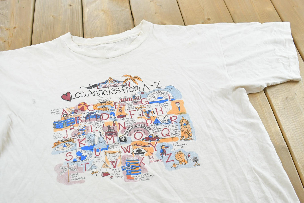 Vintage 1990s Los Angeles A-Z Sight Seeing Souvenir T-Shirt Men's L from propervintagecanada