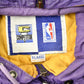 Vintage 1990s Los Angeles Lakers NBA Full Zip Puffer Jacket Men's XL from propervintagecanada