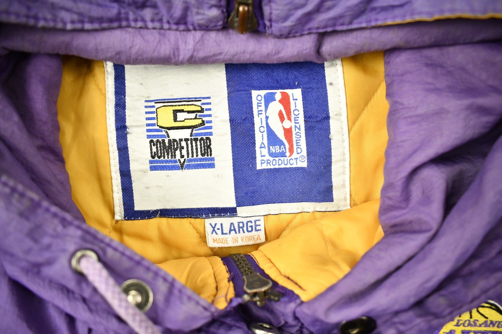 Vintage 1990s Los Angeles Lakers NBA Full Zip Puffer Jacket Men's XL from propervintagecanada