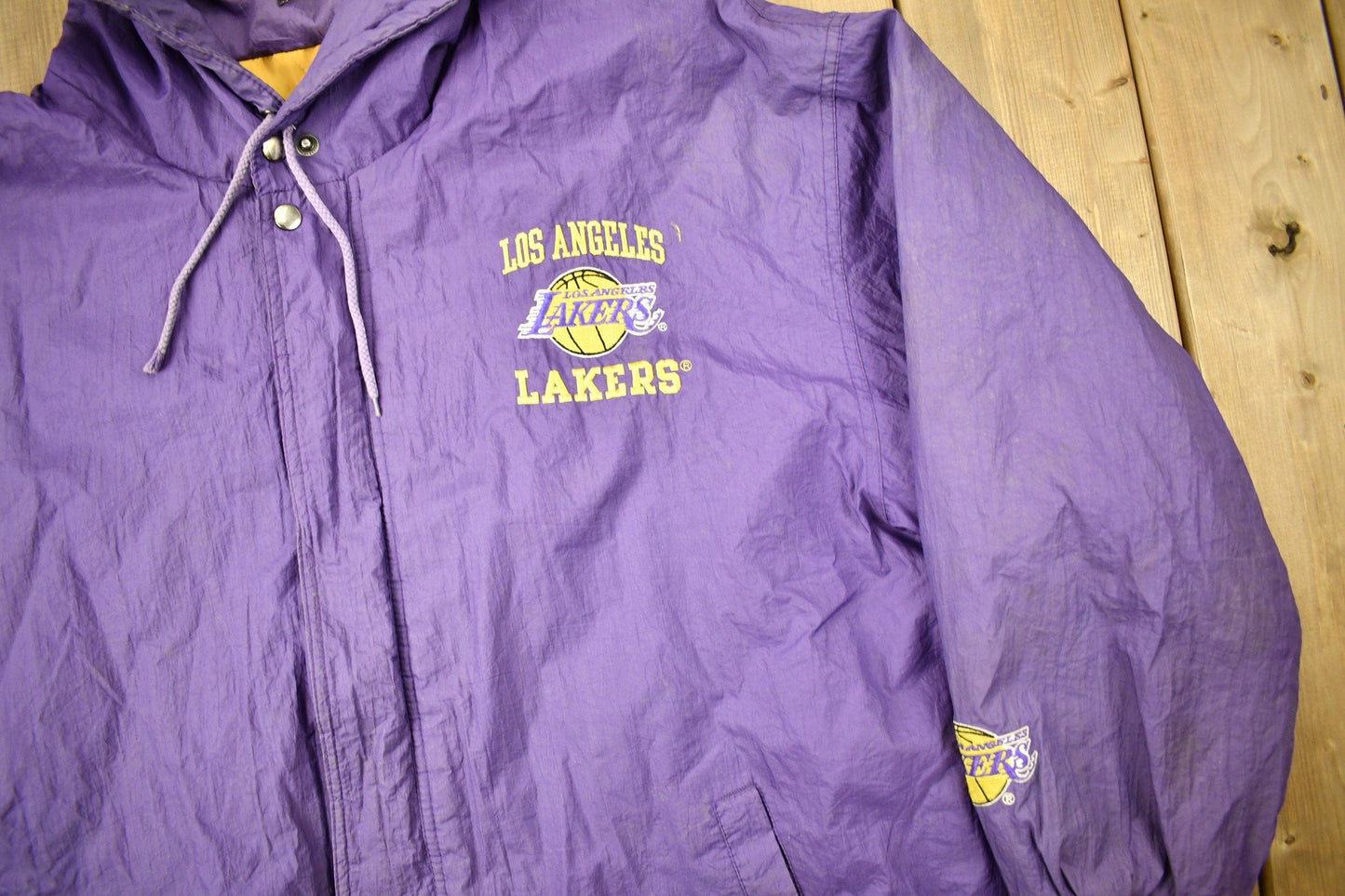 Vintage 1990s Los Angeles Lakers NBA Full Zip Puffer Jacket Men's XL from propervintagecanada