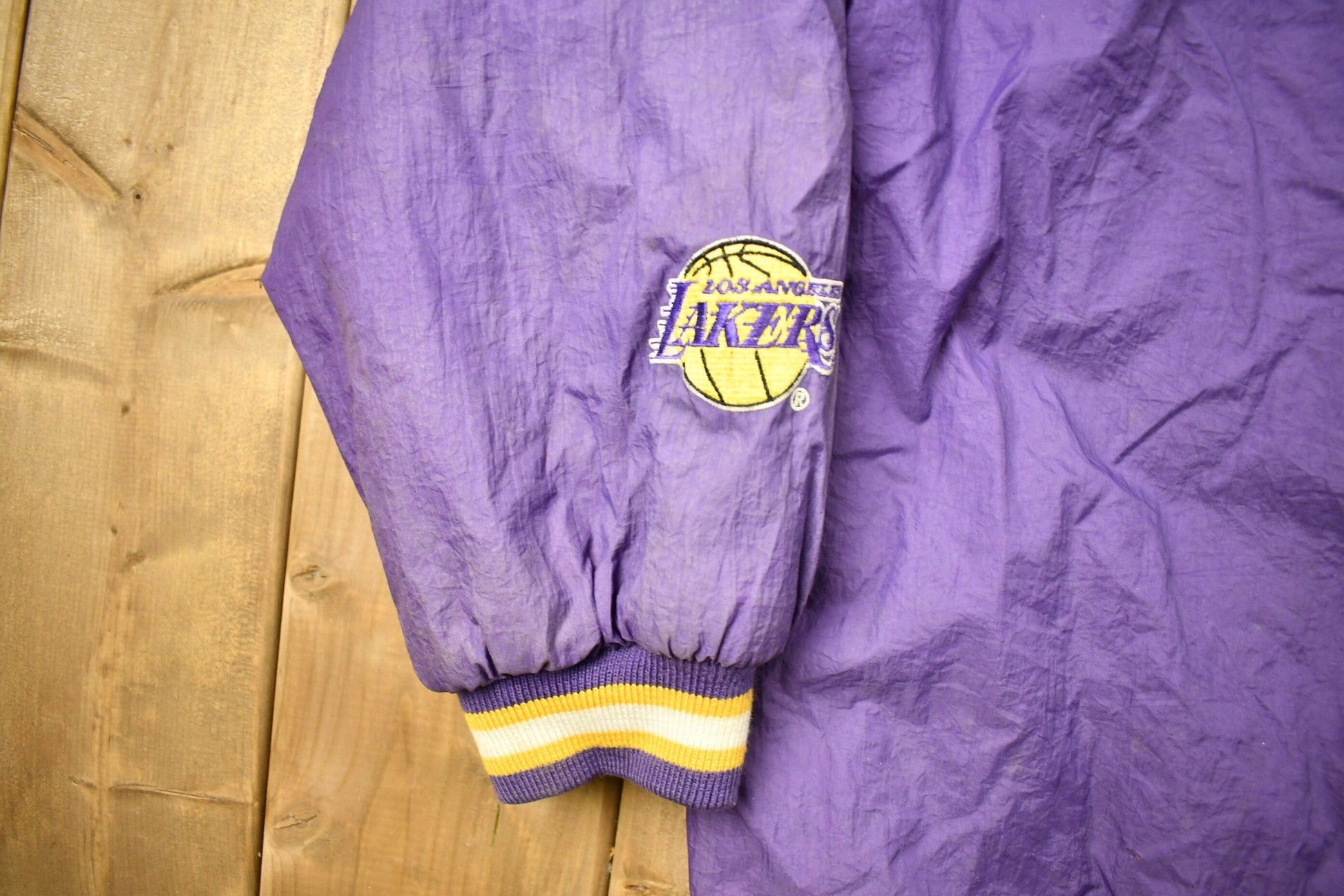 Vintage 1990s Los Angeles Lakers NBA Full Zip Puffer Jacket Men's XL from propervintagecanada