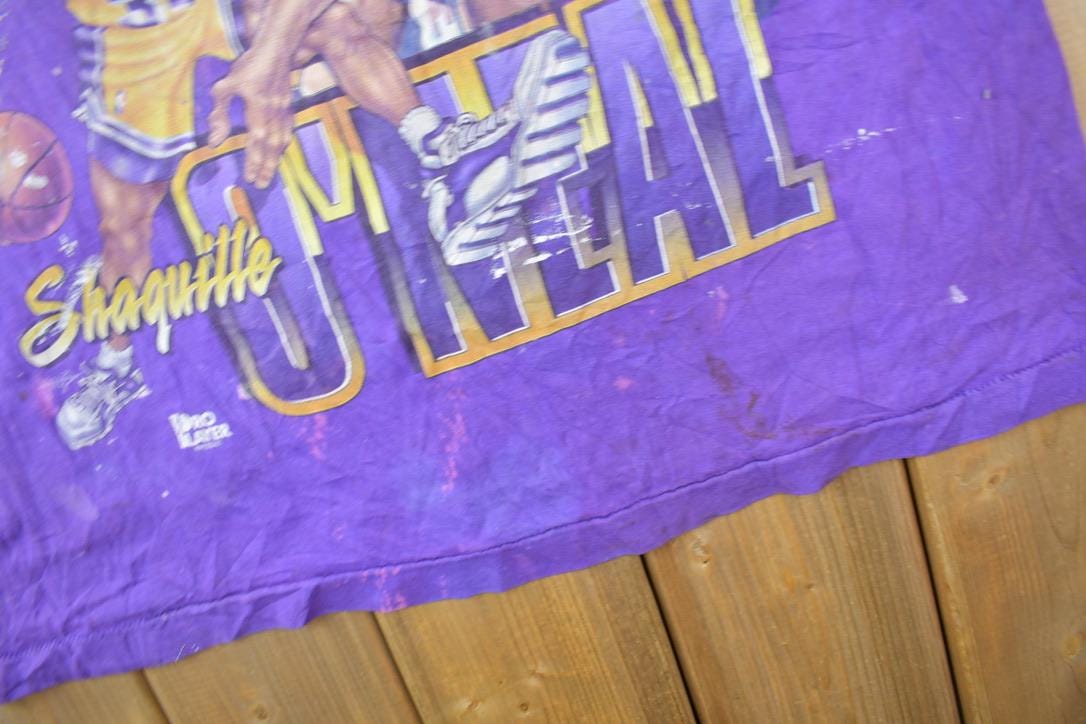 Vintage 1990s Los Angeles Lakers NBA Shaquille O'Neal Graphic T-Shirt Men's XL from propervintagecanada