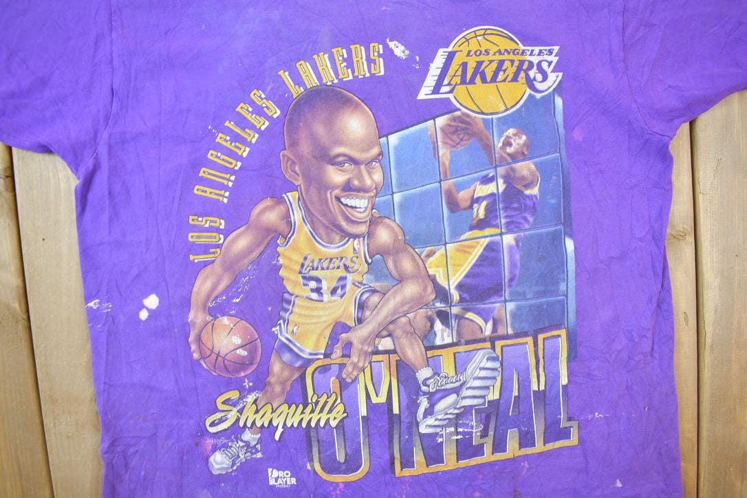 Vintage 1990s Los Angeles Lakers NBA Shaquille O'Neal Graphic T-Shirt Men's XL from propervintagecanada