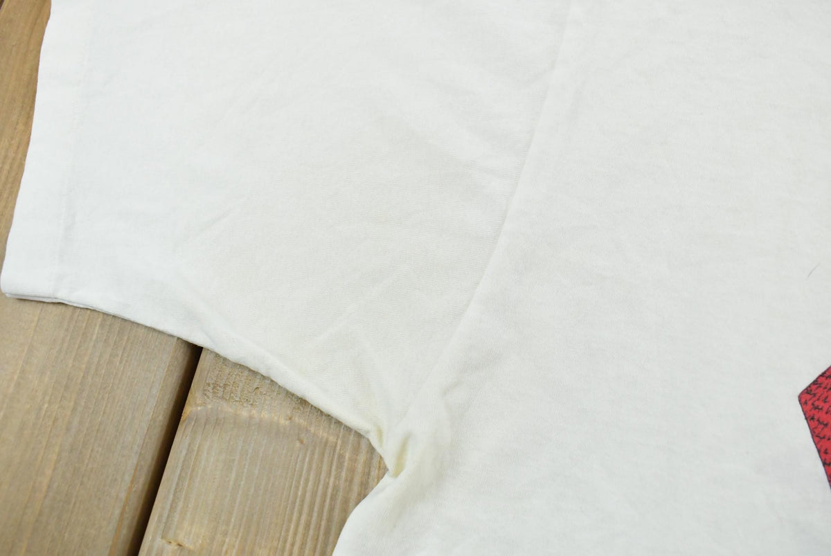 Vintage 1990s Los Angeles Saxophone Music T-Shirt Men's L from propervintagecanada