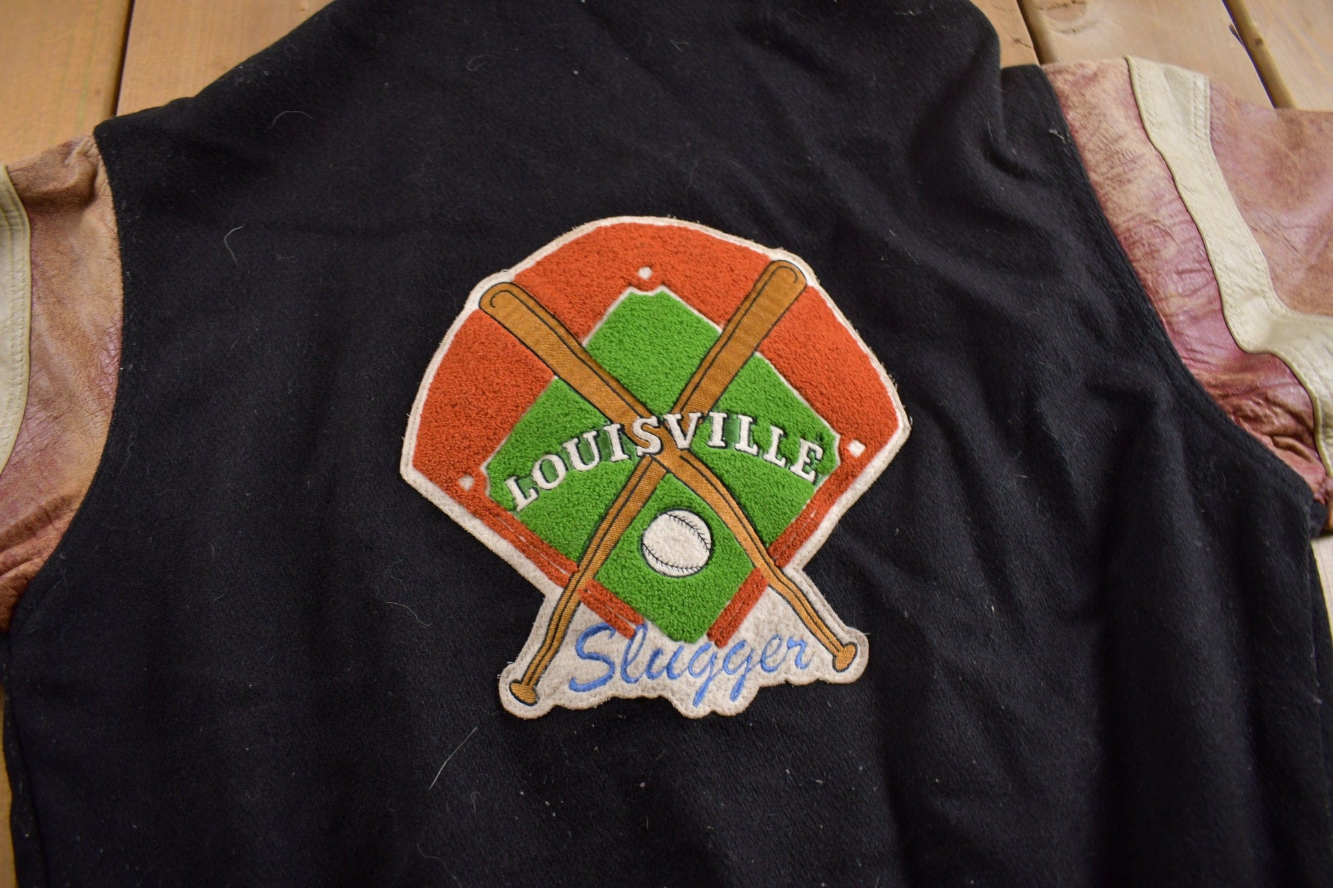Vintage 1990s Louisville Slugger Baseball Leather Varsity Jacket Men's XL from propervintagecanada