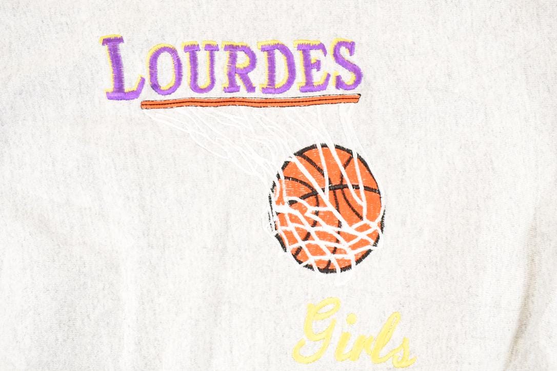 Vintage 1990s Lourdes Girls Basketball Cross Grain Crewneck Sweatshirt Women's XL from propervintagecanada