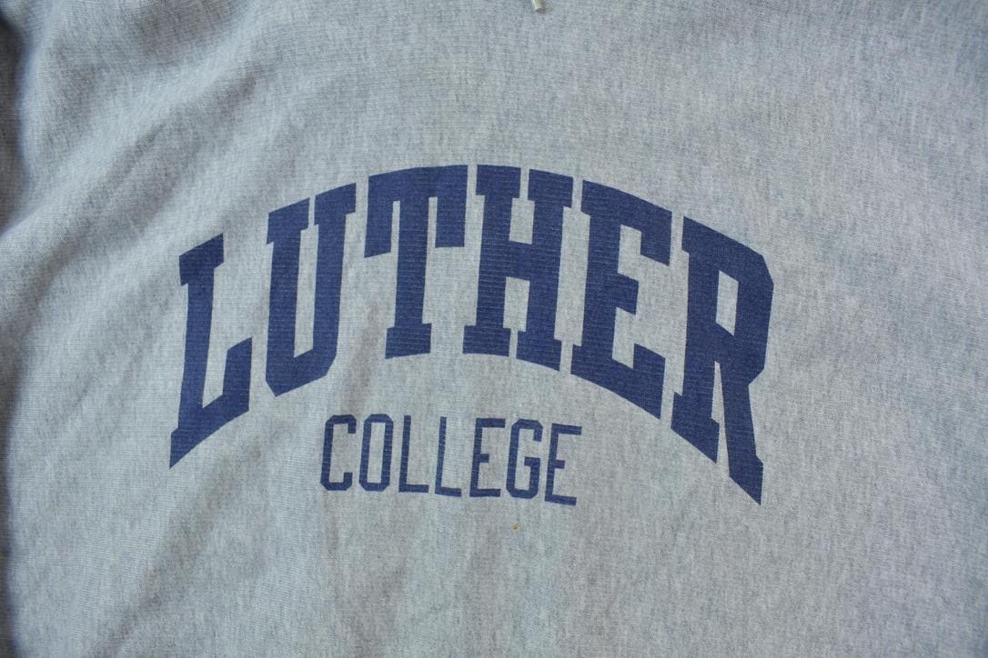 Vintage 1990s Luther College Champion Hoodie Men's 2XL from propervintagecanada
