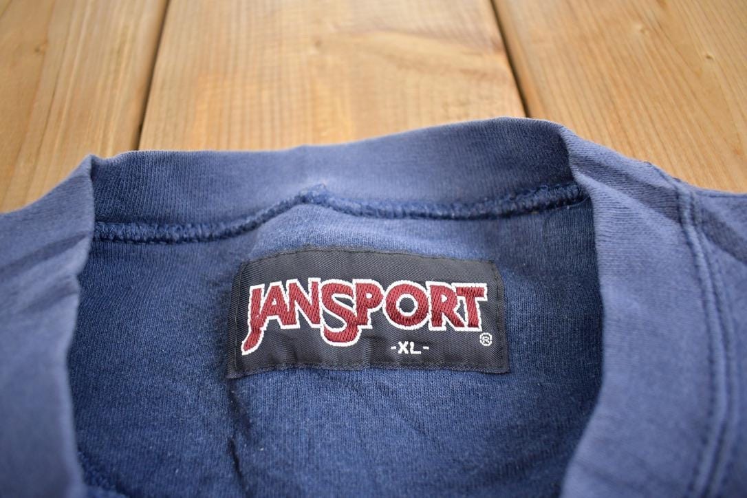 Vintage 1990s Luther College Embroidered Jansport Crewneck Sweatshirt Men's XL from propervintagecanada
