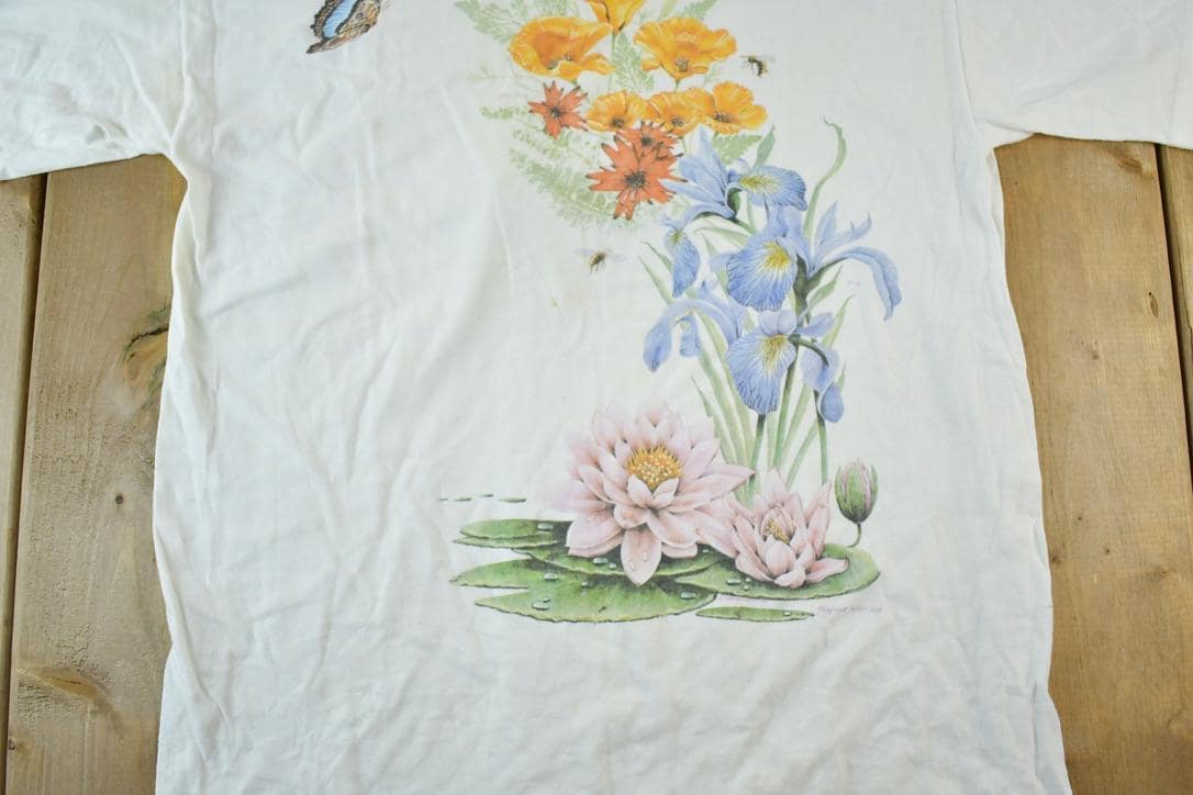 Vintage 1990s Lyndhurst Canada Floral Souvenir Single Stitch Graphic Print T-Shirt Men's Medium from propervintagecanada