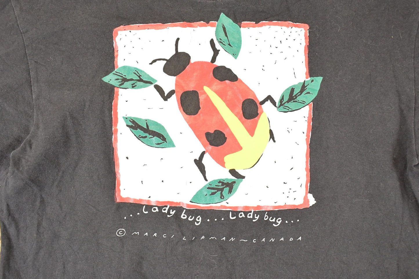 Vintage 1990s Marci Lipman Ladybug Souvenir Cartoon T-Shirt Women's S from propervintagecanada