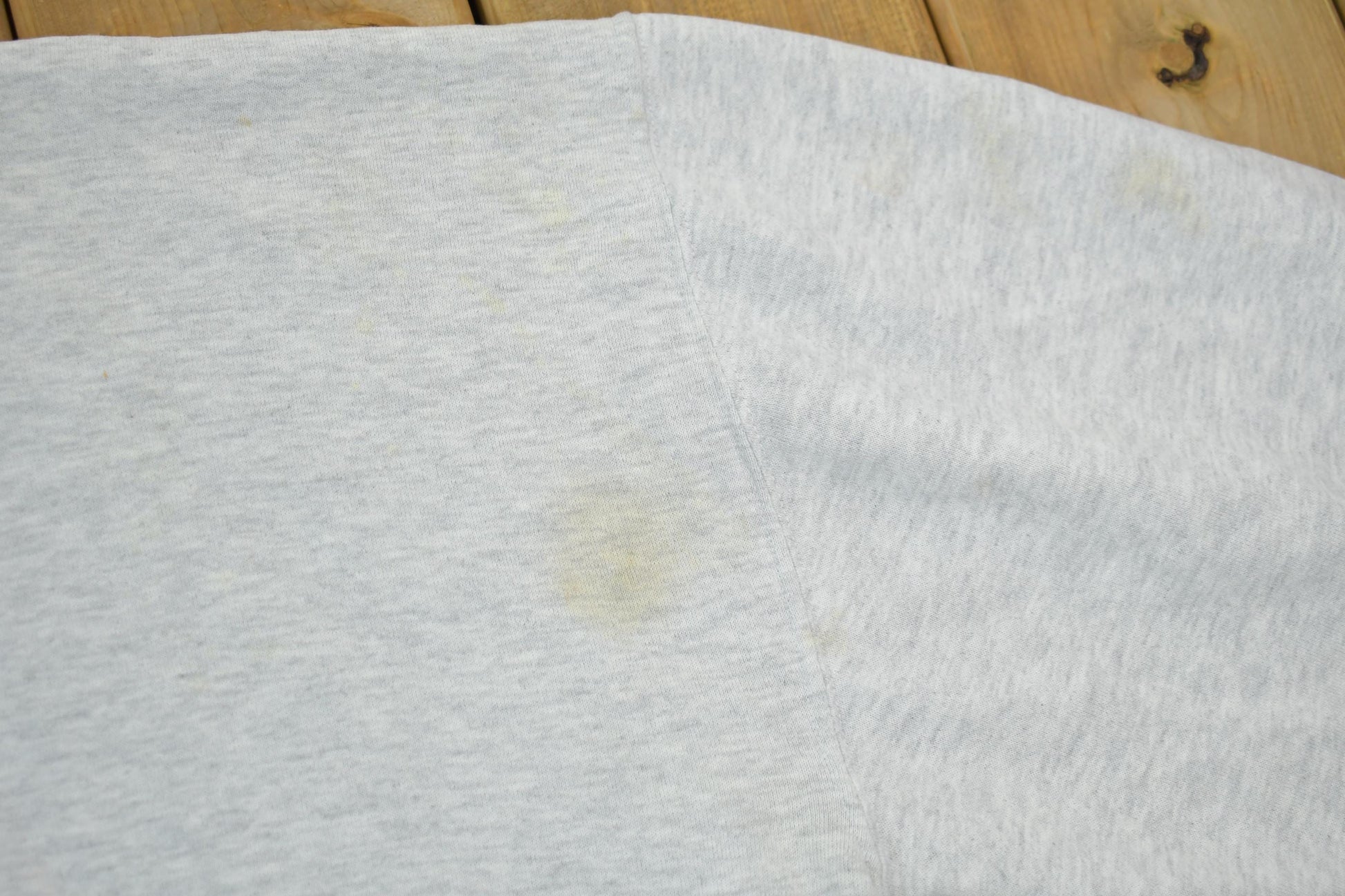 Vintage 1990s Marian College Crewneck Sweatshirt Men's 2XL from propervintagecanada