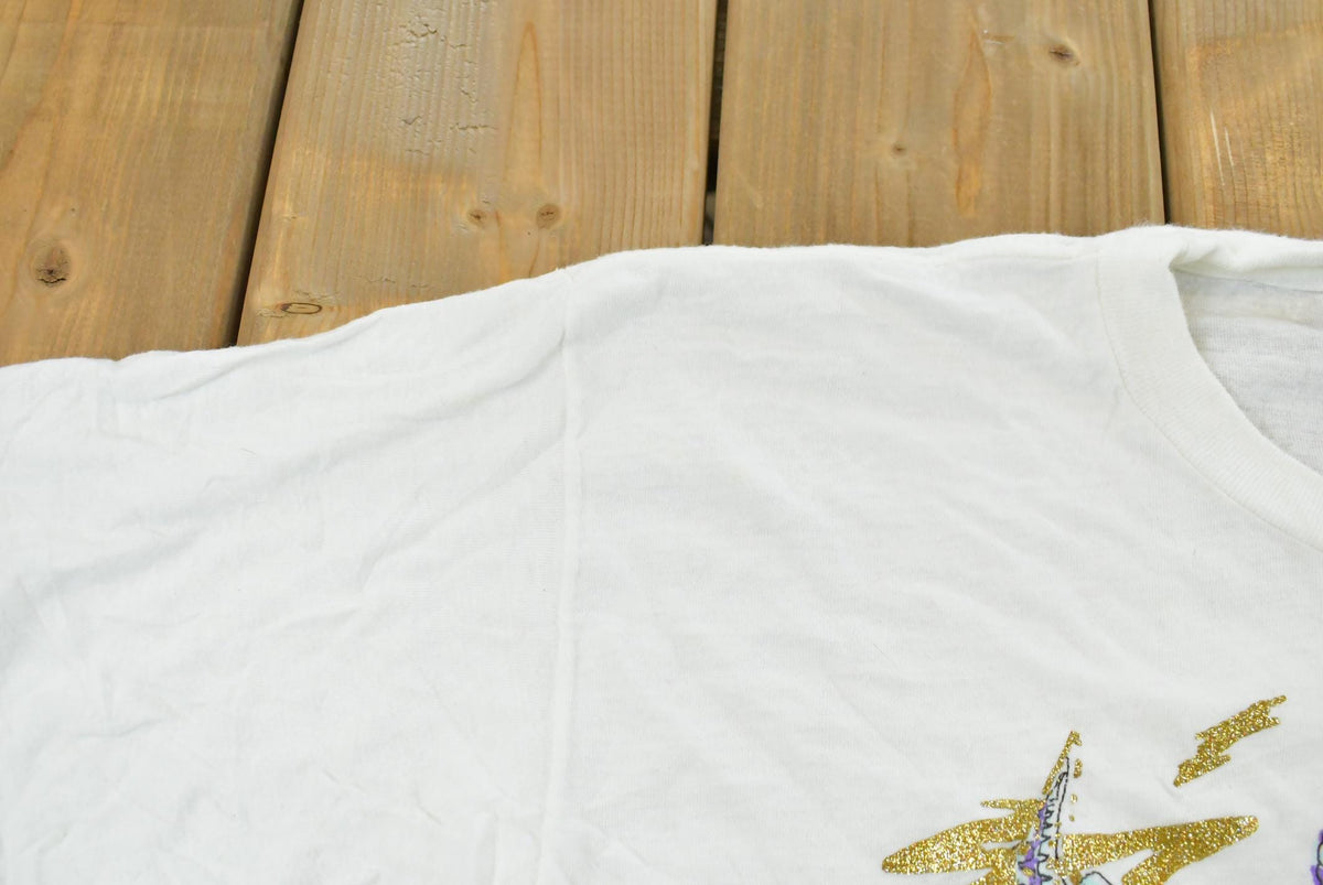 Vintage 1990s Maui Hawaii Diamond Dust Fish Graphic T-Shirt Men's L from propervintagecanada