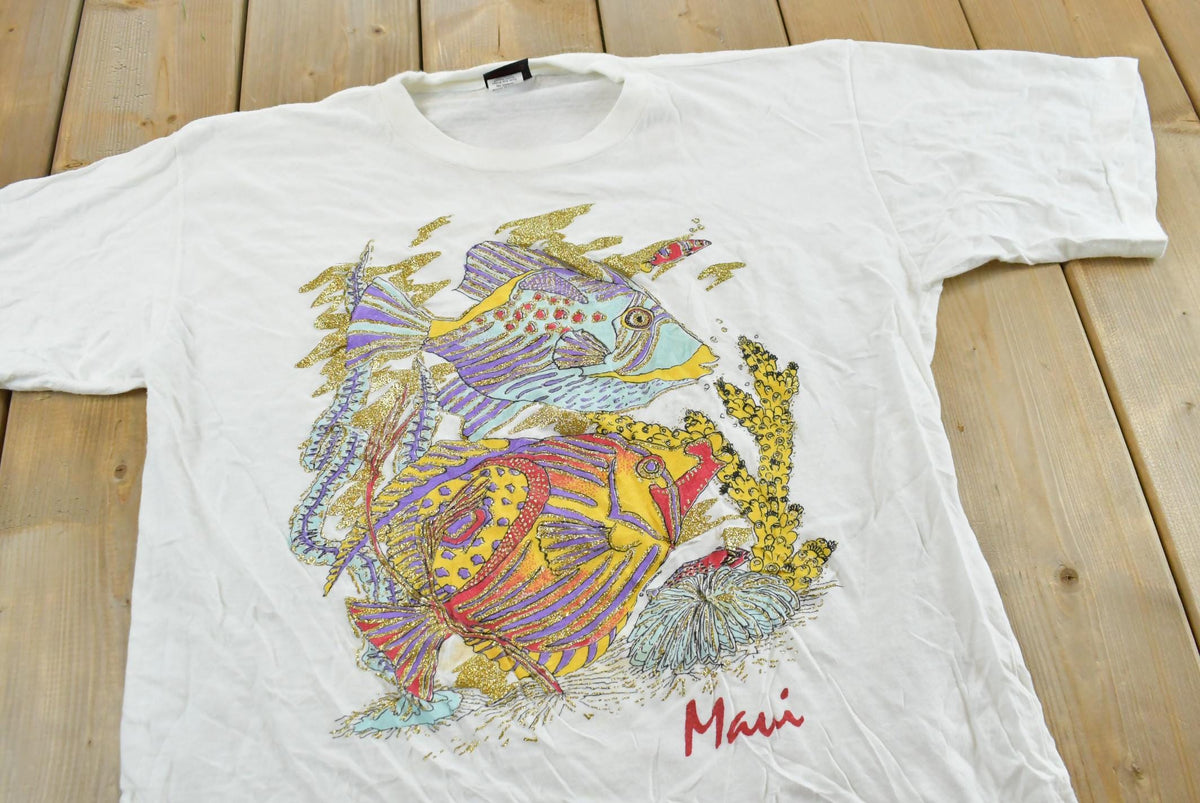 Vintage 1990s Maui Hawaii Diamond Dust Fish Graphic T-Shirt Men's L from propervintagecanada