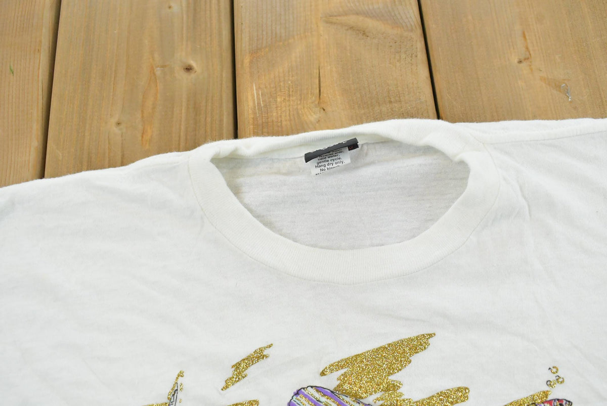 Vintage 1990s Maui Hawaii Diamond Dust Fish Graphic T-Shirt Men's L from propervintagecanada