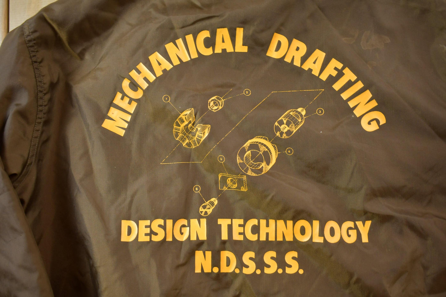 Vintage 1990s Mechanical Drafting Embroidered Snap Button Satin Jacket Men's L from propervintagecanada