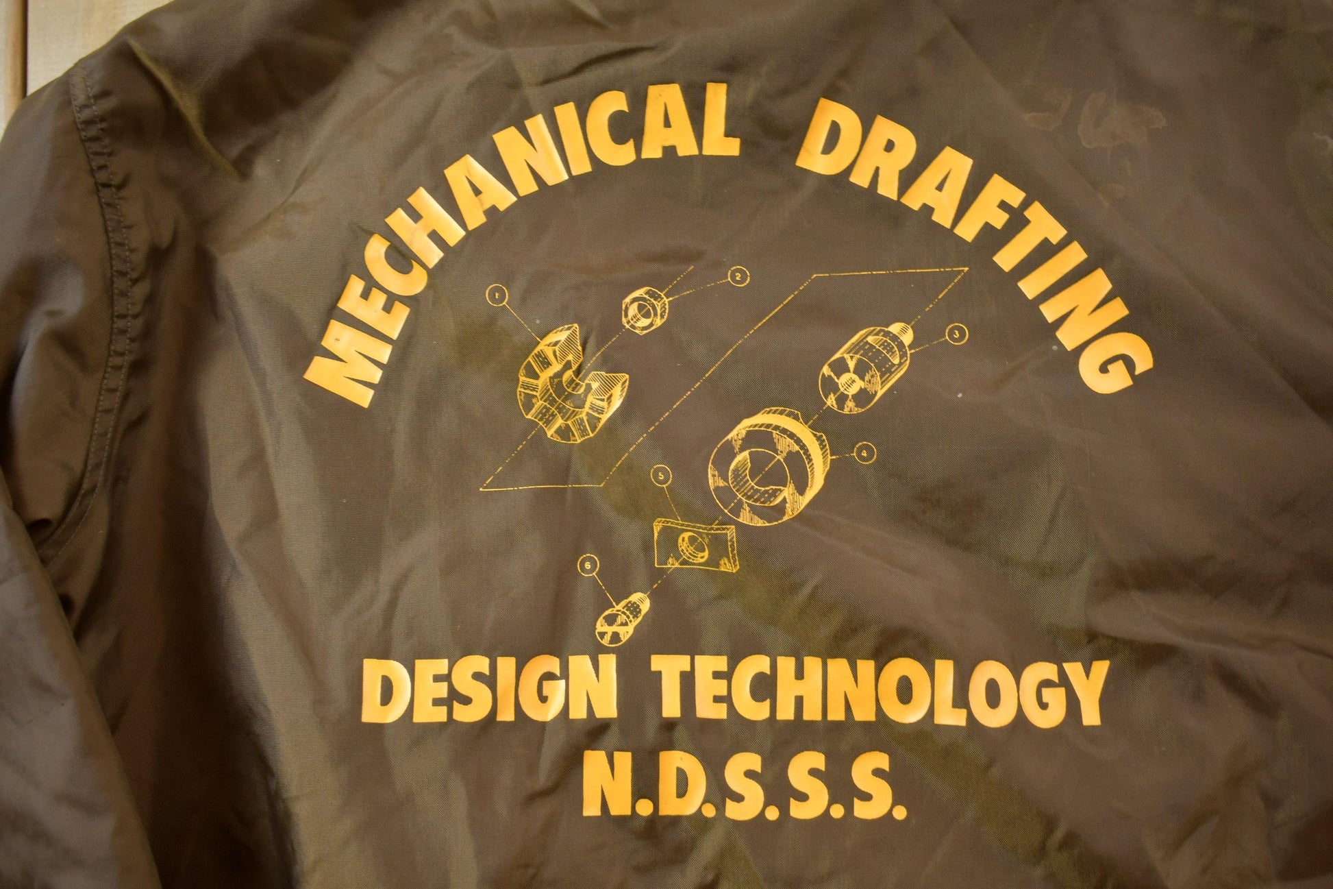 Vintage 1990s Mechanical Drafting Embroidered Snap Button Satin Jacket Men's L from propervintagecanada